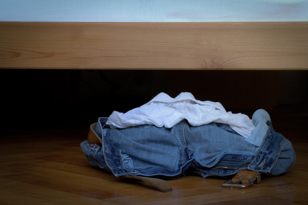 Pair of blue jeans on the floor